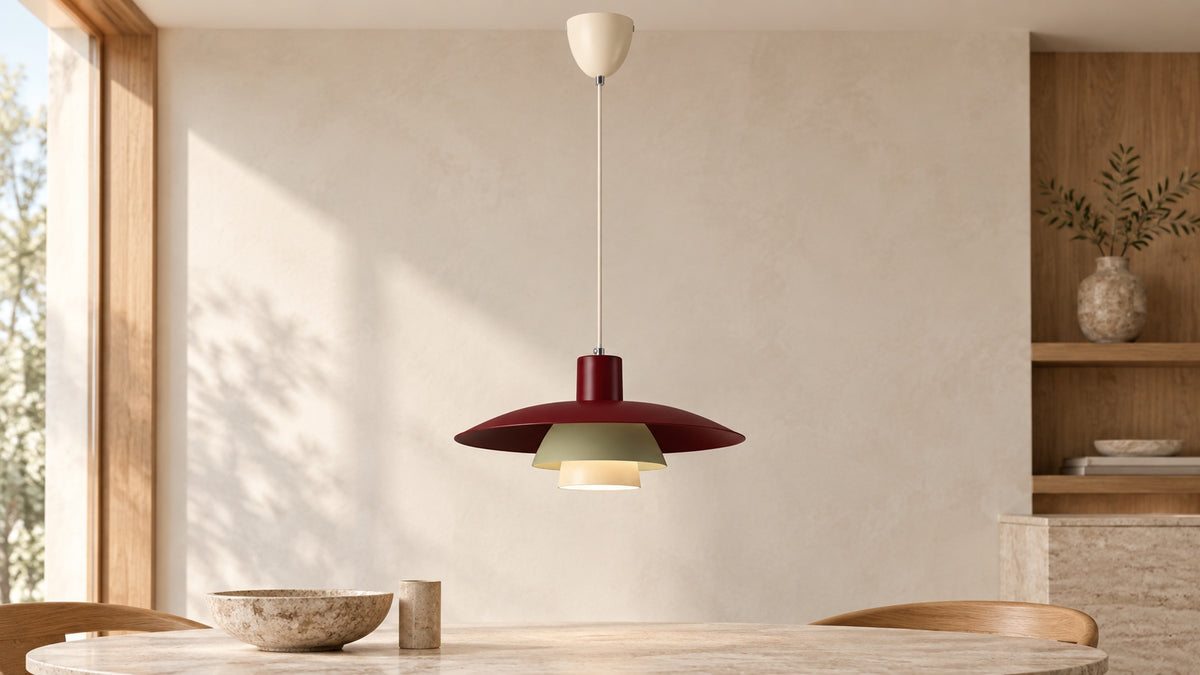 Adjustable HDECO Balance pendant lights in RAL 1019 grey beige, RAL 6003 olive green and RAL 3005 wine red above a kitchen island